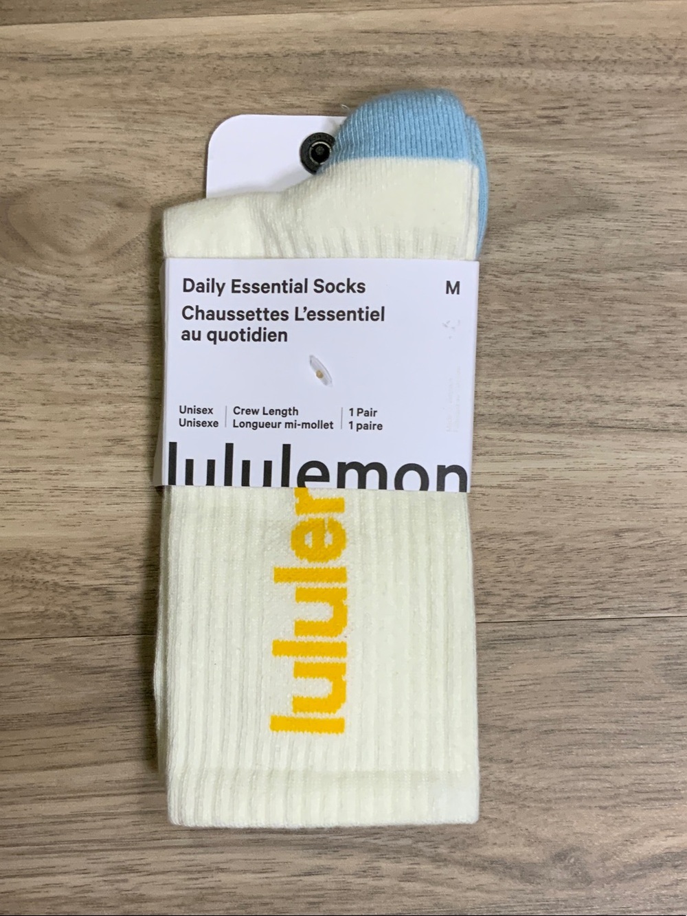 lululemon athletica Crew Socks in Cream with Blue Toe and Yellow Logo